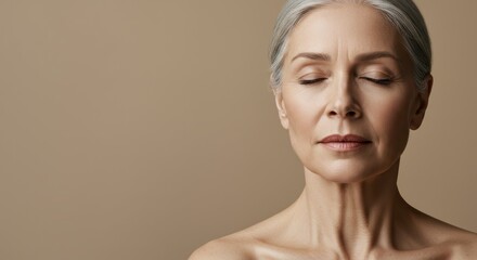 Serene Portrait of Mature Woman with Silver Hair and Closed Eyes