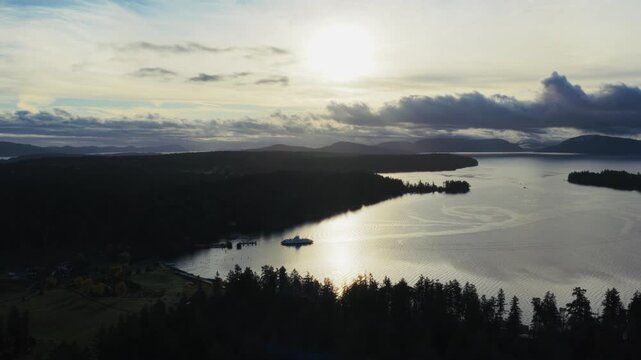 Silhouettes Of Thetis Island Ferry Terminal, Ferry Ramp In Thetis Island, British Columbia, Canada. Aerial Pullback Shot
