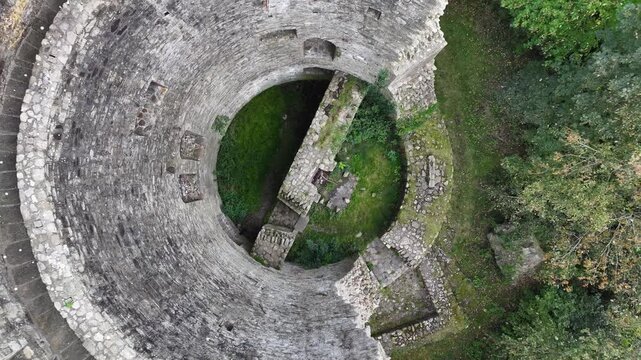 Drone symmetry look down to castle tower on island. Cloughoughter Castle Ireland.
