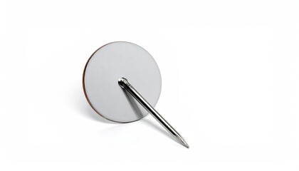 Close-up of push pin tilted on a white surface