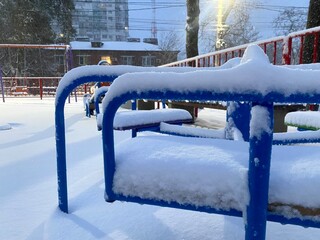 Obraz premium Children playground covered with snow