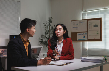 Business people having discussion in modern office meeting