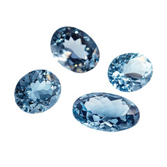 Fototapeta premium Four oval, cut, light blue gemstones on a black background