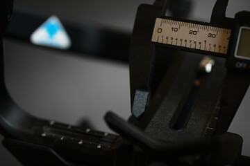 Close-Up of Precision Equipment with Ruler for Measurement and Calibration in Industrial Setting