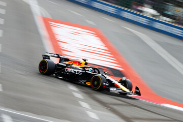 Naklejka premium BAKU, AZERBAIJAN - SEPTEMBER 20, 2025: Sergio Perez drives the #11 Oracle Red Bull Racing RB20 during the Azerbaijan Grand Prix on the Baku City Circuit