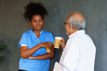 The doctors and nurses are discussing the surgery for the patient.