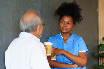 The doctors and nurses are discussing the surgery for the patient.