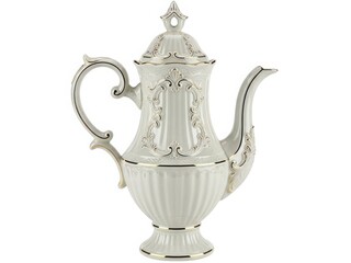 Elegant white ceramic teapot with ornate design