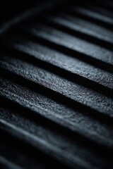 Extreme Close Up Cast Iron Grill Pan Texture with Dramatic Lighting