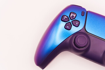 A gamepad for consoles on a white background, gaming addiction, gaming ban for teenagers, gaming controls for parents, for banners and advertising. High quality © Karen Vardanian