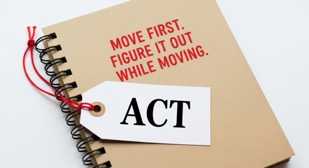 Notebook with red text 'Move first. Figure it out while moving.' and ACT tag encouraging action