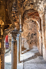 Stone columns with arches in an old building
