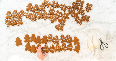 Decorating Gingerbread Man Cookies with Royal Icing for Festive Occasions