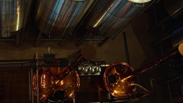 Copper Brewing Kettles and Steel Fermenters Arranged in Symmetric Layout Viewed From Above at Ba Na Hills Vietnam Brewery in High Angle View, Craft Production