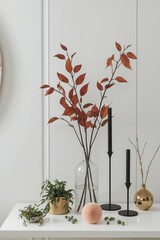 Autumnal decor display on white shelf