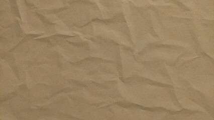 Brown crumpled paper texture abstract background. Crumpled recycled kraft paper surface. Old...