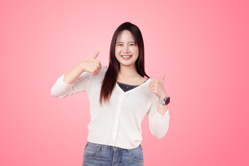 Asian woman, Thai cute model teen girl standing happy smile two thumbs up pose positive expression