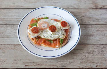 Brunch toast with smoked salmon and fried egg