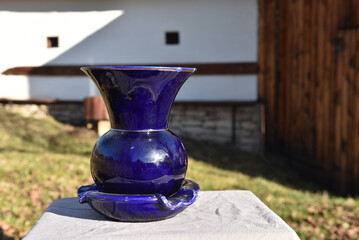 Cobalt blue ceramic vase with matching dish