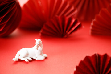 A festive Chinese New Year background with red paper fans.