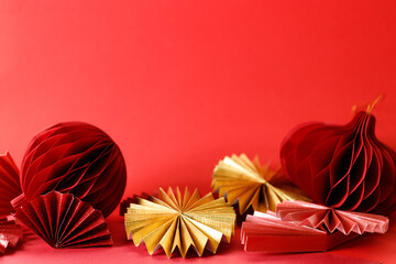 A festive Chinese New Year background with red paper fans.