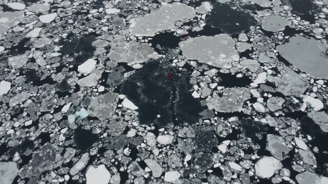 Two Small Boats Navigating Through Ice and Icebergs Near Perez Cape