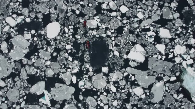 Two Small Boats Navigating Through Ice and Icebergs Near Perez Cape