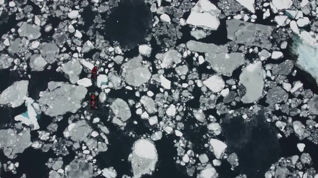 Two Small Boats Navigating Through Ice and Icebergs Near Perez Cape