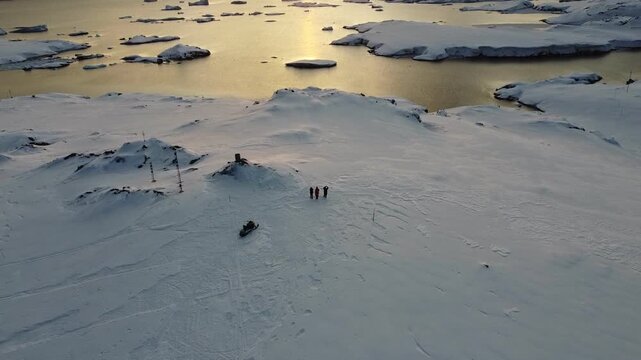 Nacreous Clouds Over Antarctica with People Below, Aerial Drone View