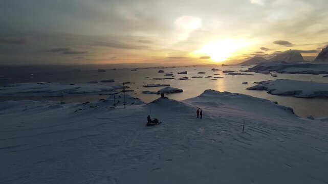 Nacreous Clouds Over Antarctica with People Below, Aerial Drone View