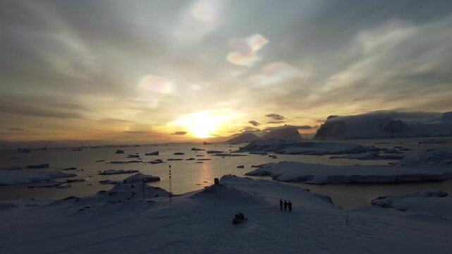 Nacreous Clouds Over Antarctica with People Below, Aerial Drone View