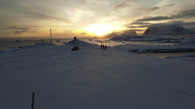 Nacreous Clouds Over Antarctica with People Below, Aerial Drone View