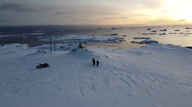 Nacreous Clouds Over Antarctica with People Below, Aerial Drone View
