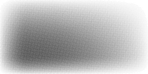 Vintage halftone dots texture with smooth gradient fade in black and white.