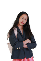 Confident young Asian girl in dark blazer with backpack standing with arms crossed against white background.