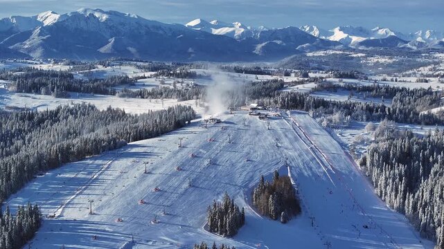Aerial view of winter ski resort in Bialka Tatrzanska, Poland with lifts
