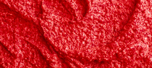 Red berry yogurt ice cream. Fresh fruit smoothie with strawberries, raspberries, pomegranate and red currants. Ice cream texture. Delicious sweet dessert close-up as a background. © Vera