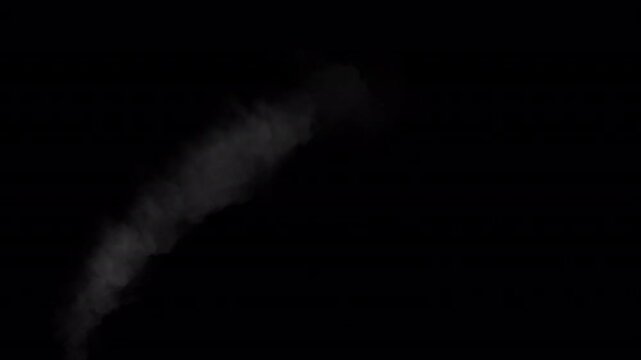Rising smoke from a single point drifting right seamless loop