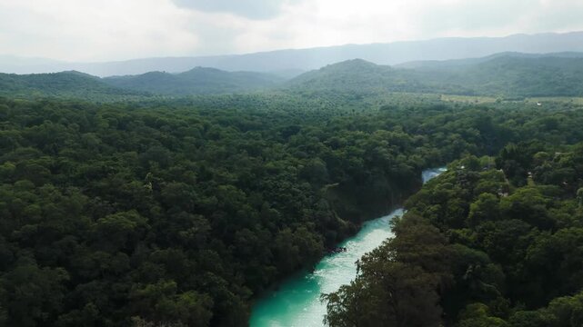 Explore el meco waterfall in el naranjo, san luis potosi, mexico among lush tropical nature
