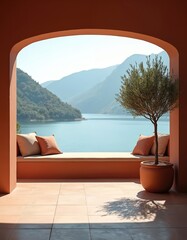 Naklejka premium Scenic view of lake with mountains from open patio. Olive tree in pot and cushions on bench add comfort. Terrace is tiled with terracotta tones for warm look. Elegant space.
