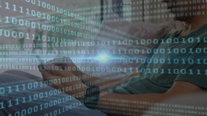 Animation of looping binary codes, lens flare over asian man using smartphone at home - Powered by Adobe