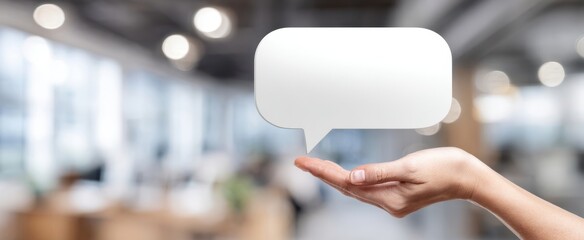 The Speech Bubble Above An Open Hand Representing Communication And Digital Messaging In Office