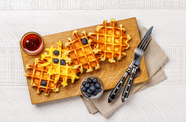 Homemade waffles with maple syrup