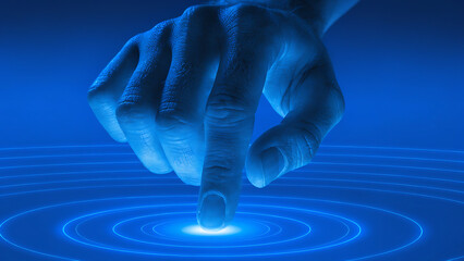 Close-up of Hand Index Finger Touching Glowing Blue Digital Interface Circle, Futuristic Technology Concept
