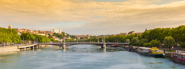 Panorama of evening light over the Rhone river in Lyon, France