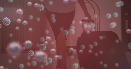 Animation of covid cells over male doctor holding screen with medical data processing - Powered by Adobe