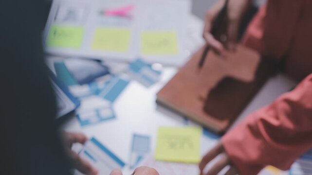 team of UI UX web designer are working together to develop mobile responsive websites. Mobile Mockup