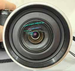 Camera lens and optics colour reflections