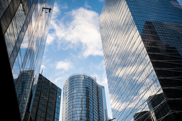 Architecture skyscraper office corporate skyline clouds blue modern, Paris La Defense highrise towers and glass facades for technology and finance