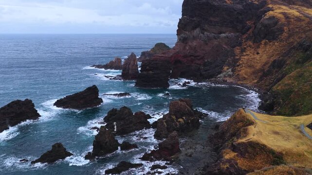 Dramatic Tsutenkyo Arch and Kuniga Coast on Stormy Day, Oki Islands, Japan